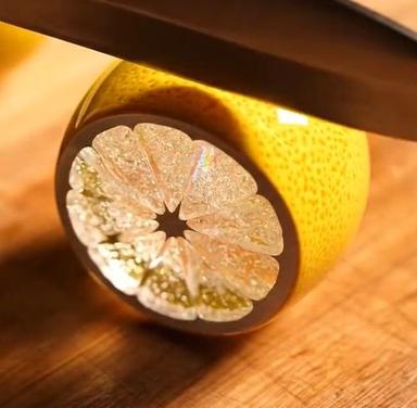 Create an ASMR video prompt for glass Orange
